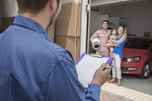 Family home moving day in Hillingdon with packed furniture and boxes