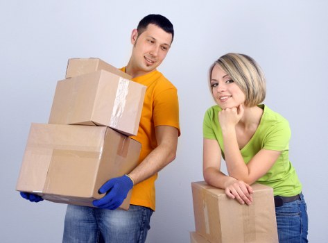 Staff completing a safety check before moving belongings