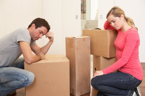 Trained movers handling items carefully with proper lifting techniques